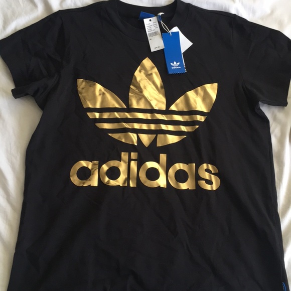 adidas shirt gold logo